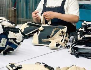 Hand finishing a carrier